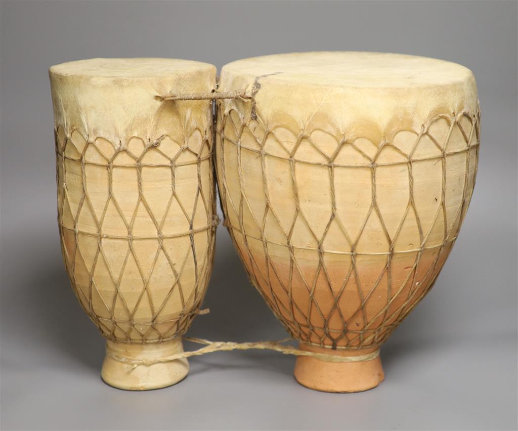 A pair of Moroccan strapped clay drums (Tbila)